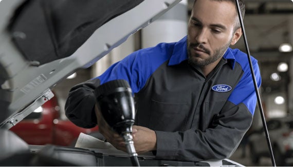 Certified Ford Diesel Technicians Working on Truck Powertrain